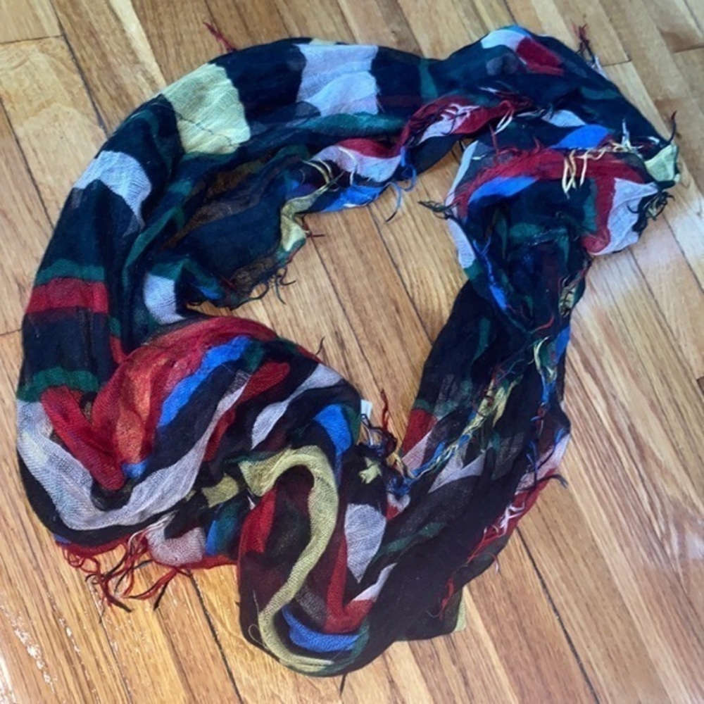 Colorful soft frayed infinity scarf.